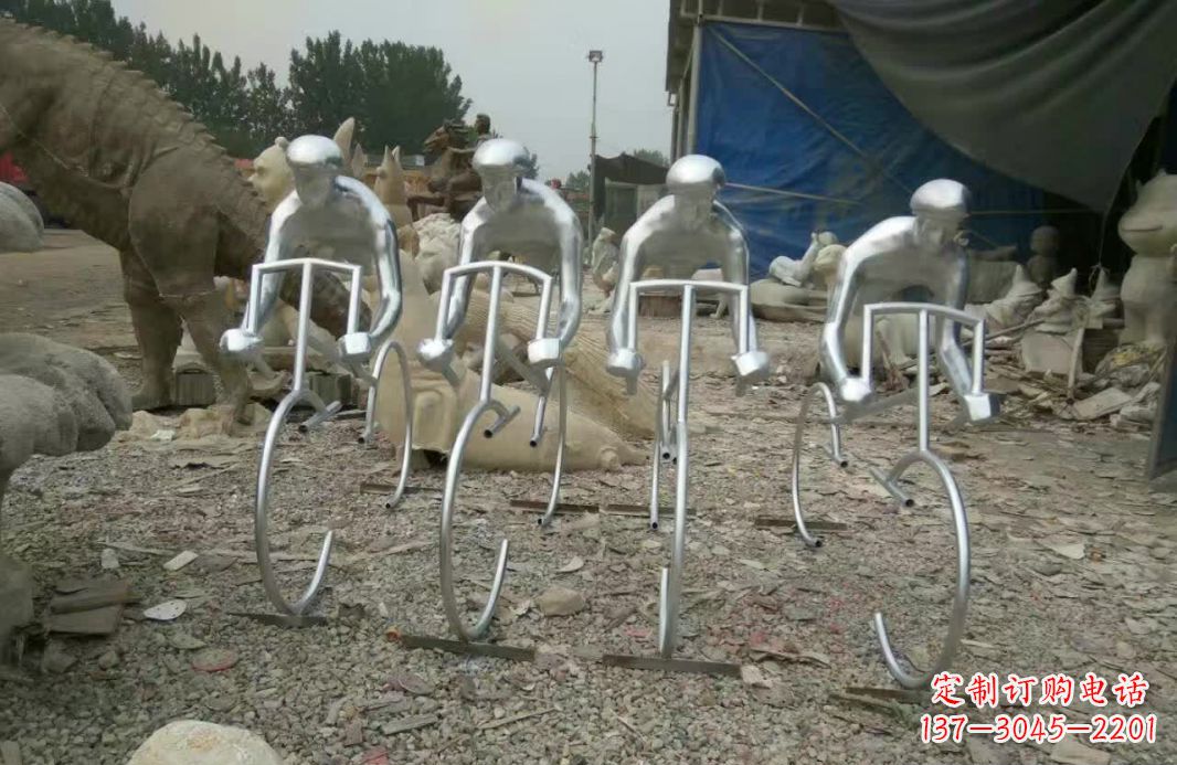 安阳不锈钢广场抽象骑自行车人物雕塑