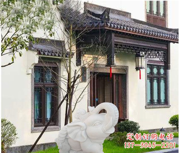 安阳踩元宝铜钱的小象门口招财石雕