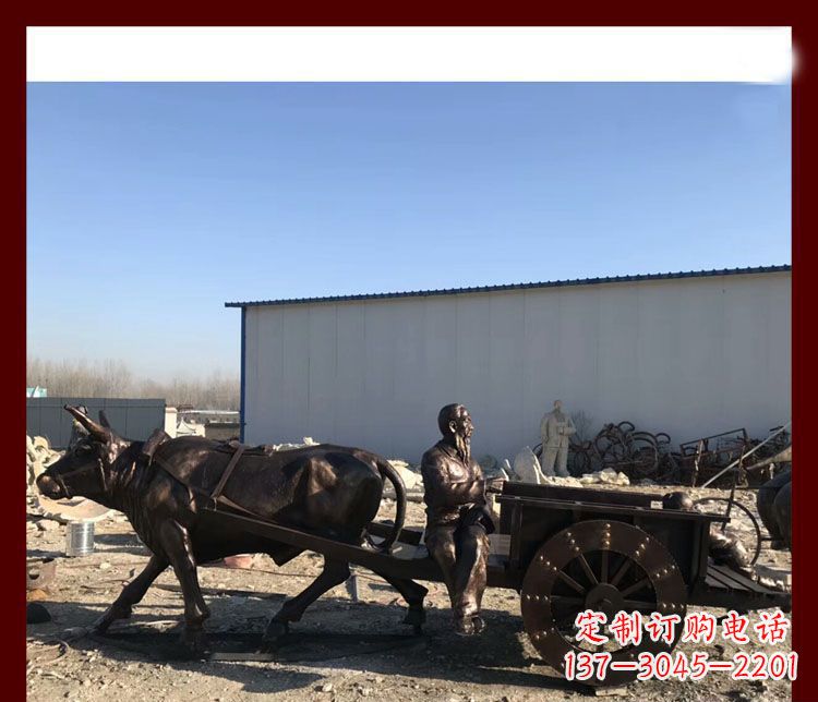 安阳赶牛车的祖孙俩铜雕