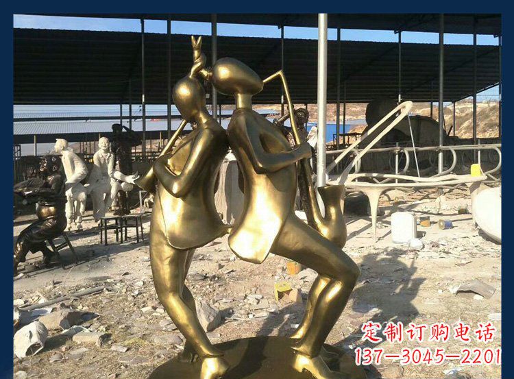 安阳中领雕塑：优雅萨克斯铜雕贴金吹管人物雕塑