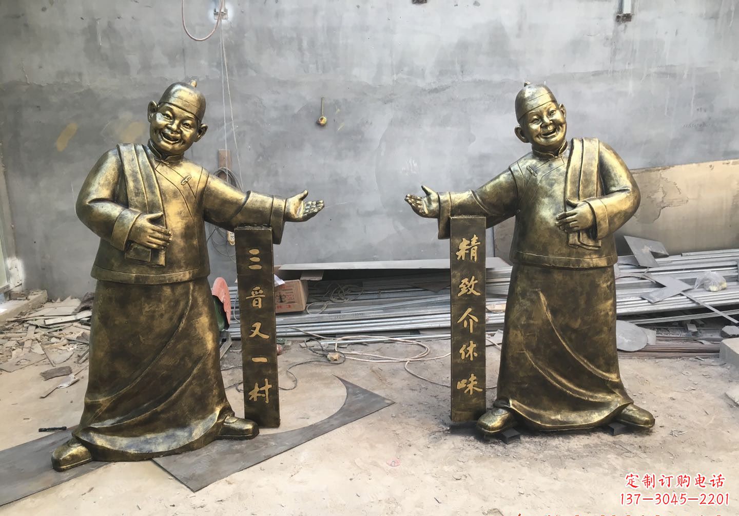 安阳中领雕塑:酒店门口店小二人物铜雕