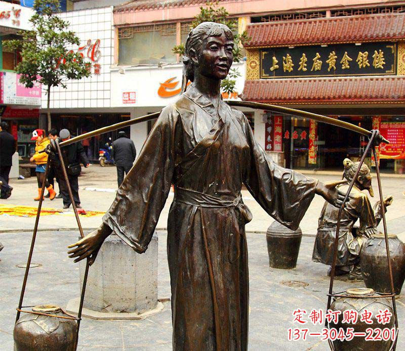 安阳挑着罐子的古代女人铜雕