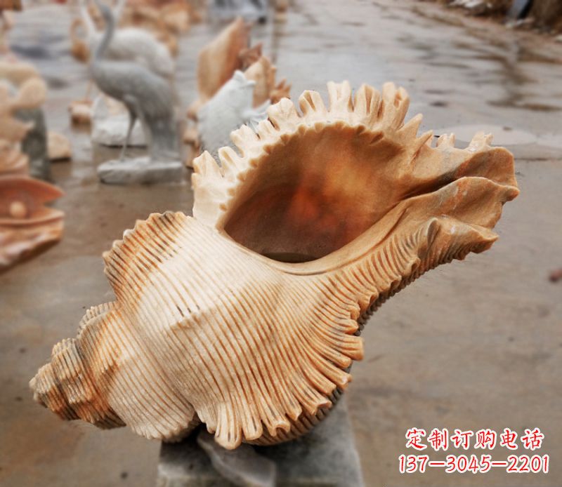 安阳晚霞红海螺石雕广场景观雕塑