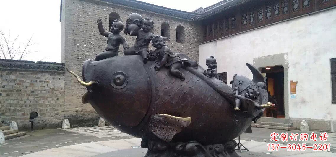 安阳小孩骑鱼铜雕