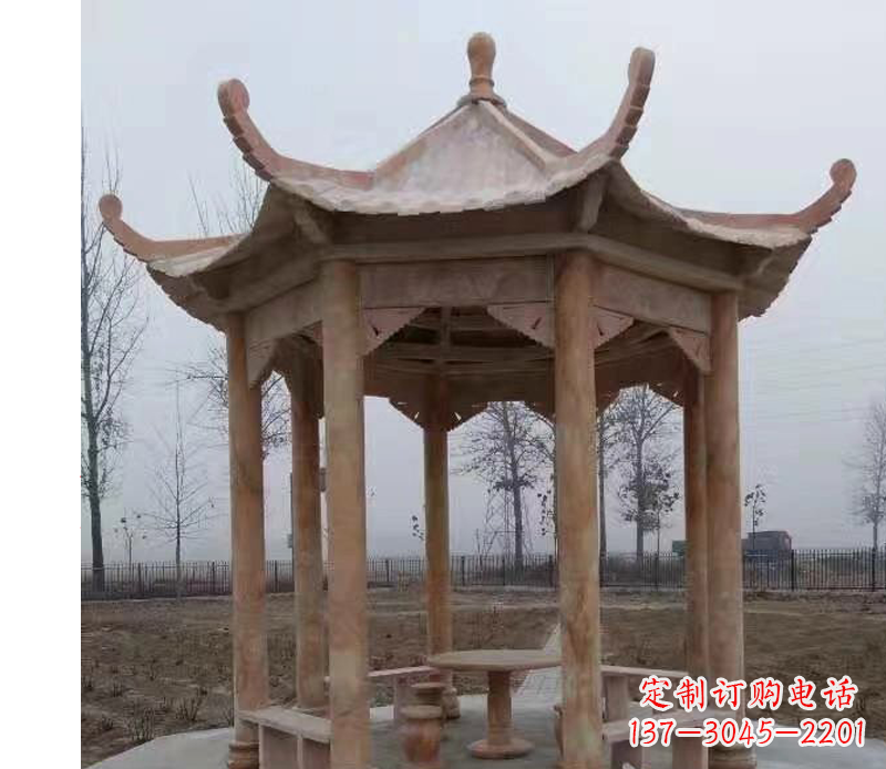 安阳公园晚霞红八角石雕凉亭